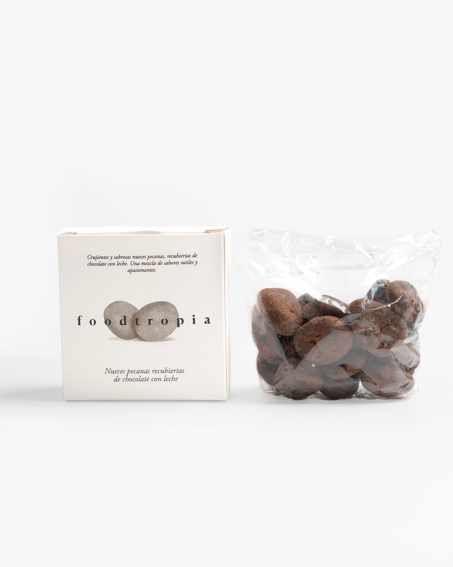 Nueces pecanas recubiertas de chocolate con leche
