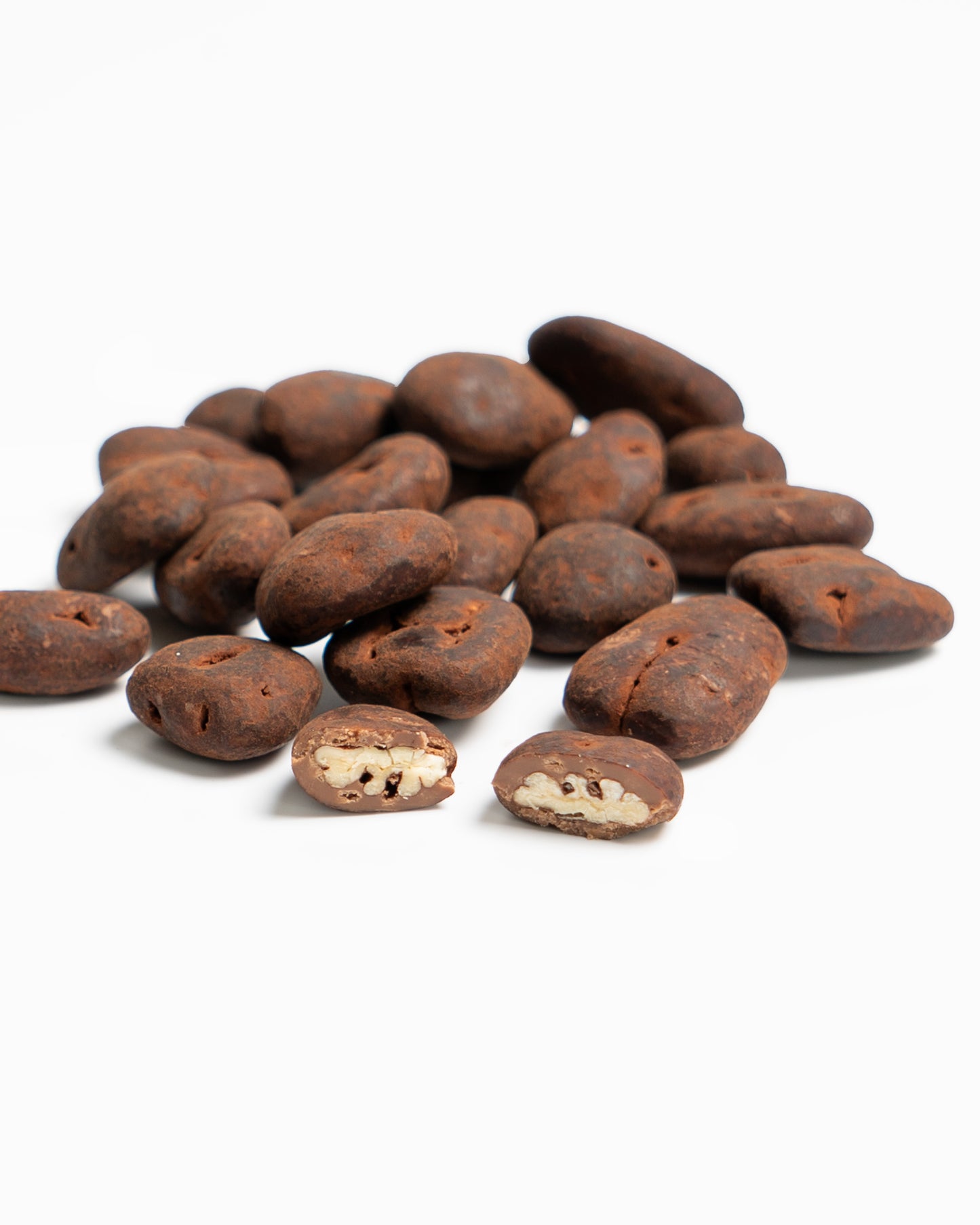Nueces pecanas recubiertas de chocolate con leche