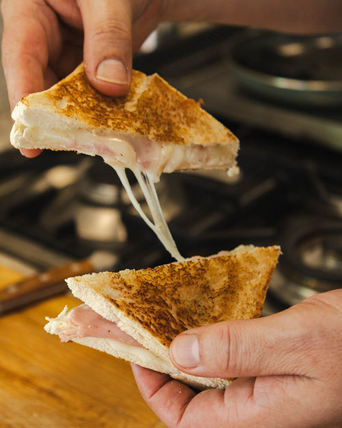 queso de barra de oveja fundido