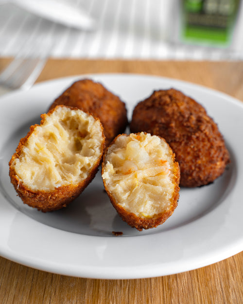 Croquetas de puerro confitado y langostino