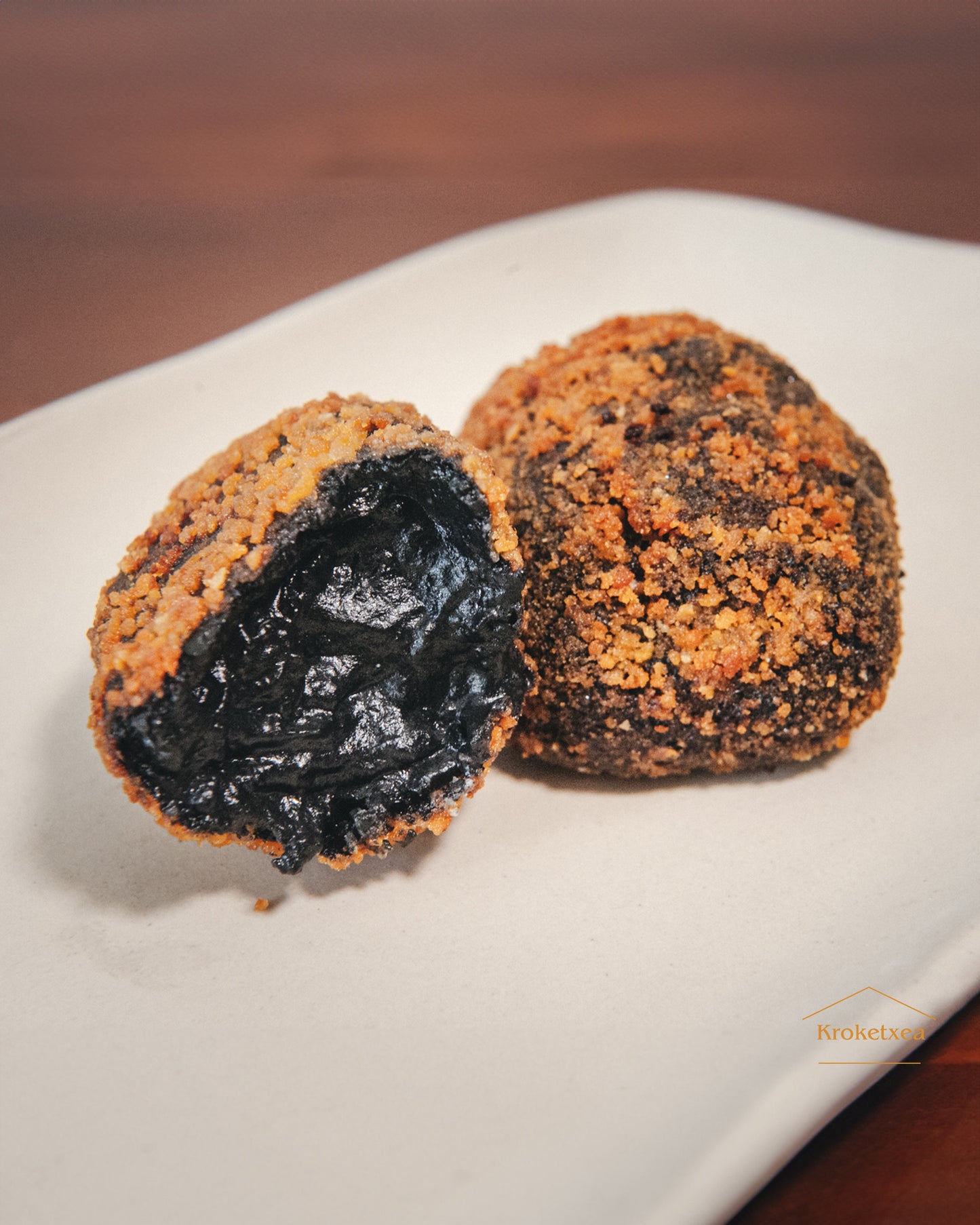 Croquetas chipirón en su tinta