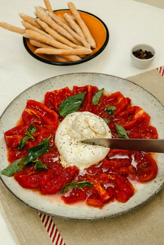 Burrata con tomate