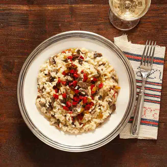 arroz meloso con champiñones y queso añejo