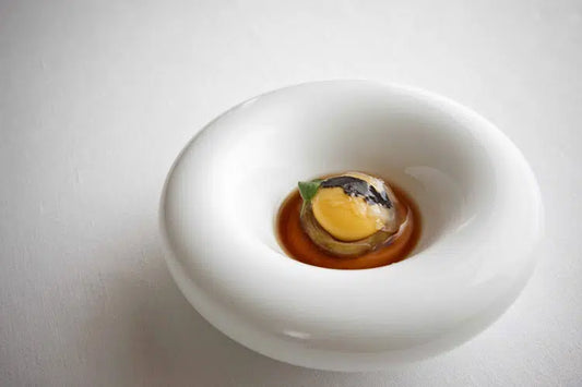 receta de corazón de alcachofa sobre crema de patata y falsa yema con trufa negra de Francis Paniego