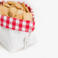 Cesta de pan con tela de picnic